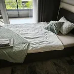 Cozy Urban Residence Studio - Balcony With Garden View
